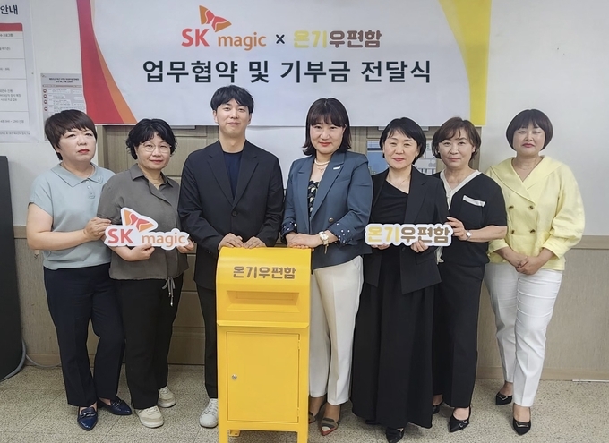 좌로부터 세번째 조현식 온기 대표, 박미영 SK매직 중부4총국장.